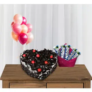  heart shape black forest cake with bunch of 5 blown balloons with pack of 5 bounty chocolates 