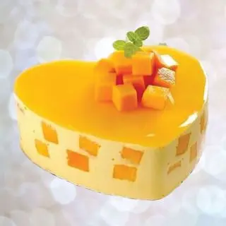 heart shape premium quality mango cool cake 