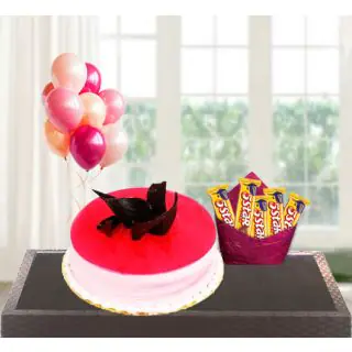  strawberry cake with pack of Five 5star  chocolate with bunch of 5 blown balloons