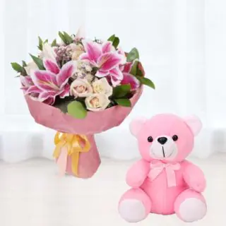 Beautiful hand bouquet of mix exotic flowers with 6 inch height pink teddy bear 