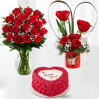 20 red roses in glass vase with 3 red roses in photo mug, with Half kg heart shape red velvet cake 