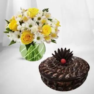 20 Mix flowers arranged in glass vase with half kg chocolate fudge cake 