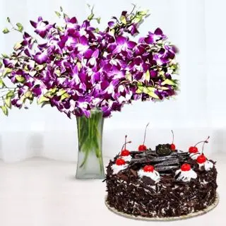 20 orchids arranged in glass vase with 1 kg black forest cool cake 