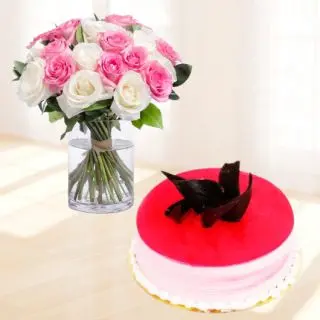 20 pink and white roses arranged in glass vase with half kg strawberry cool cake 
