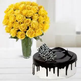 20 yellow roses arranged in glass vase with 1 kg choco vanilla cake 