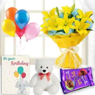 Bunch of 5 yellow lilies, 1 feet height teddybear, 2 dairy milk silk chocolates , birthday Greeting card with 5 blown balloons 