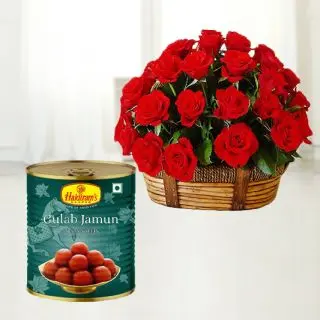 Basket arrangement of 50 red roses with 1 kg haldiram gulabjamun