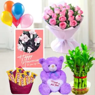 Bunch of 15 pink roses, 6 inch height teddybear, pack of 5 fivestar chocolates, 2 layer Lucky bamboo plant ,5 blown balloons with anniversary greeting card