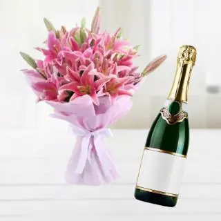 Bunch of 5 pink oriental lilies with bottle of champegne