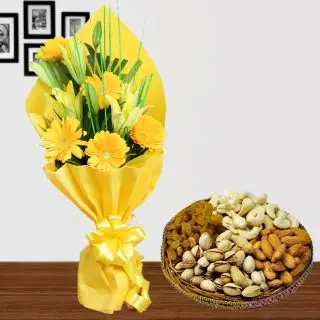 Bunch of yellow lilies with yellow gerberas with half kg assorted dryfruits