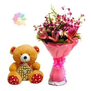 hand bouquet of lilies and orchids with 1 feet height teddy bear with 24 pcs rocher ferrero chocolates