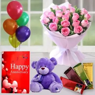 20 pink roses bunch ,  6 inch teddybear , set of 4 temptations chocolates, anniversary greeting card with 5 blown balloons 