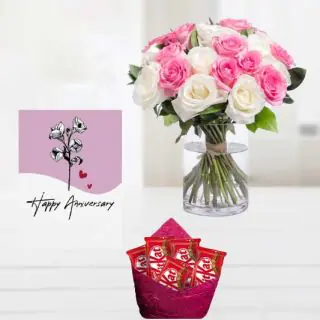 Vase Arrangement of 20 pink and white roses , pack of 5 kitkat chocolates, anniversary greeting card