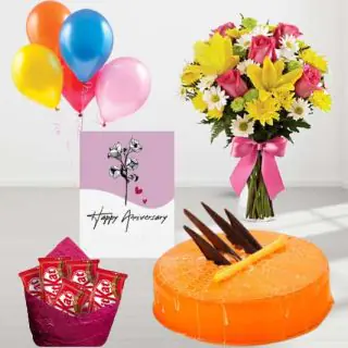 Vase arrangement of Exotic mix flowers,  Orange cool cake,pack of 5 Kitkat chocolates, anniversary greeting card, with 5 blown balloons