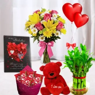 vase arrangement of 20 mix exotic flowers, pack of 5 perk chocolates, 6 inch  height teddybear, 2 layer Lucky bamboo plant, 5 blown balloons with greeting card