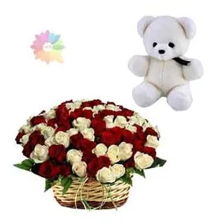 Basket arrangement of 50 red and white roses with 6 inch white teddy bear