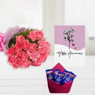 Bunch of 8 pink carnations, pack of 5 dairy milk chocolates, anniversary greeting card 