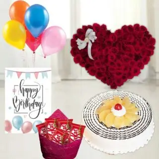 50 red roses heart shape arrangement,  pineapple premium quality cake, pack of 5 Kitkat chocolates, birthday greeting card, with 5 blown balloons