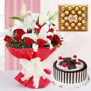 Beautiful bunch of white lilies & red roses with chocovanilla cake with 16 pcs rocher ferrero chocolates