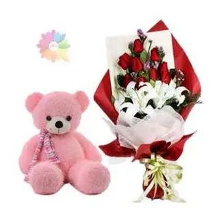 Bunch of exotic lilies with red roses with 1 feet height pink colour teddy bear