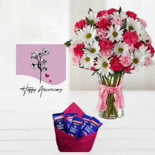 Vase arrangement of 20 mix flowers, pack of 5 dairy milk chocolates, anniversary greeting card
