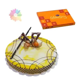  pineapple fresh cream cake with box of celebrations 