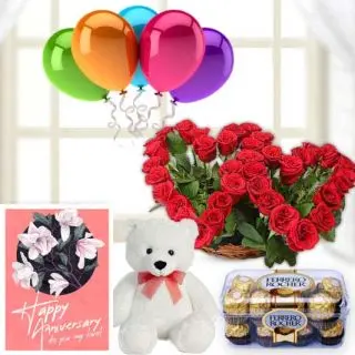 Twin heart shape Arrangement of 30 red roses, 6 inch white teddybear, 16 pcs rocher ferrero chocolates, anniversary Greeting card with 5 mix blown balloons 