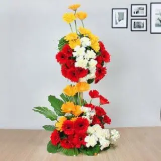 2 feet height arrangement of 100 mix colour gerberas 