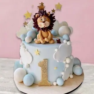 Lion theme cake in pineapple flavour for 1st Birthday 