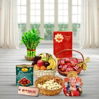 Seasonal fruit basket, Ganesha idol, Basket of KitKat chocolates, Gulab jamun, Basket of assorted dry fruits, 2 layer lucky bamboo plant with Diwali greeting card