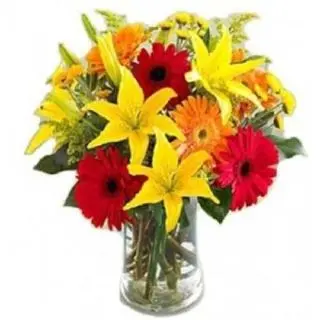 2 Lilies and 10 gerberas in glass vase