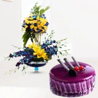 2 step designer vase arrangement with lilies, orchids and roses with black currant cool cake 