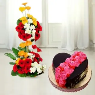 2 storey arrangement of 50 mix colour gerberas with 2 feet height with heart shape chocolate floral theme cake