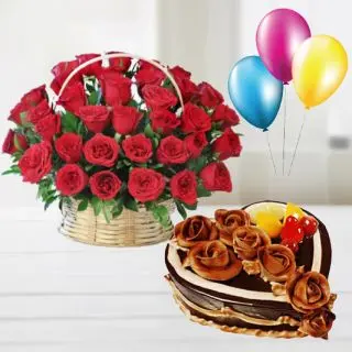 Basket of 60 red roses with chocolate heart shape cake with 3 blown balloons