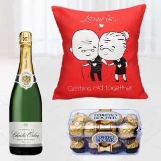 Bottle of champagne , 16 pcs rocher ferrero chocolates, photo cushion 
