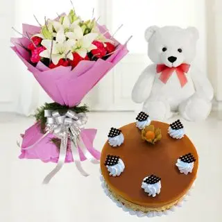 Bunch of lilies and  roses with 2 feet height teddybear with butterscotch cake 