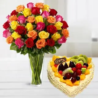 30 mix colour roses arranged in glass vase with 1 kg heart shape mix fruit cake