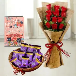 Bunch of 12 red roses in jute packing , basket of dairy milk chocolates, birthday greeting card 