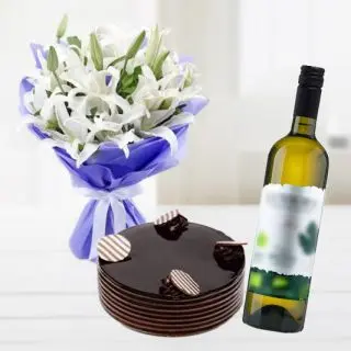 Bunch of 5 white lilies with double chocolate cake with bottle of white wine
