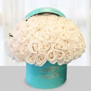 Box arrangement of 100 white roses 