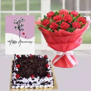 Bunch of 15 red carnations,  black forest square shape cake and anniversary  greeting card 