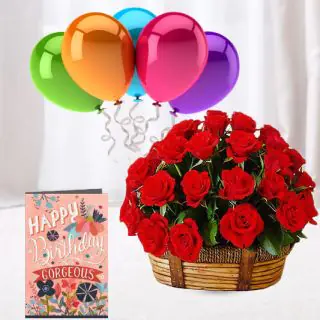 Basket arrangement of 12 red roses, 5 bunch of mix color balloons with birthday card