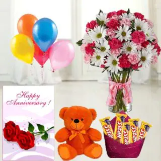 15 mix flowers in glass vase,  6 inch height   teddybear , set of 5 Fivestar  chocolates, anniversary greeting card with 5 blown mix balloons