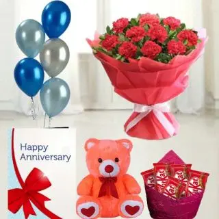 Bunch of 12 red carnations ,  6 inch height teddy bear, set of 5 kitkat chocolates, anniversary greeting card with 5 blown balloons 