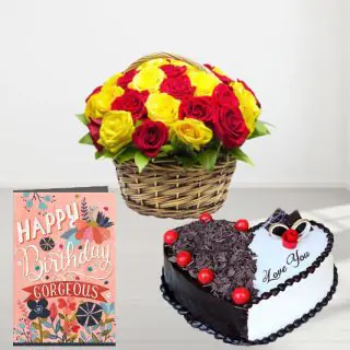 Basket of 15 red and yellow roses, black forest heart shape cake, birthday greeting card 