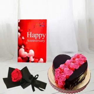 1 kg chocolate truffle heart shape cake with floral topping single red rose, with anniversary greeting card
