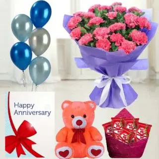 Bunch of 20 pink carnations, 6 inch height teddybear, set of 5 kitkat chocolates, anniversary greeting card with 5 mix blown balloons
