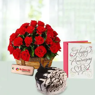 15 Red Roses Basket Arrangement with Half kg choco vanilla cake with anniversary card