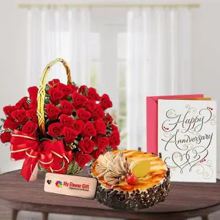 Basket Arrangement of 30 red roses with half kg irish coffee cake with anniversary greeting card 