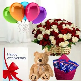 Basket of 30 red and white roses,  6 inch teddybear, set of 5 dairy milk chocolates, anniversary greeting card with 5 blown balloons